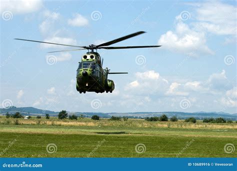 Landing helicopter stock photo. Image of transilvaero - 10689916