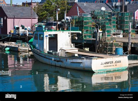 Commercial lobster fishing boats tied to pier in Portland, Maine Stock Photo - Alamy