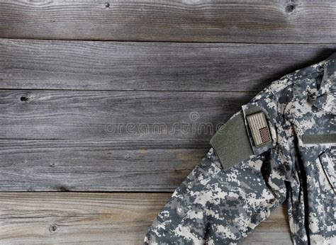 Military Uniform Jacket with USA Flag Patch on Rustic Wood Stock Image - Image of defend ...