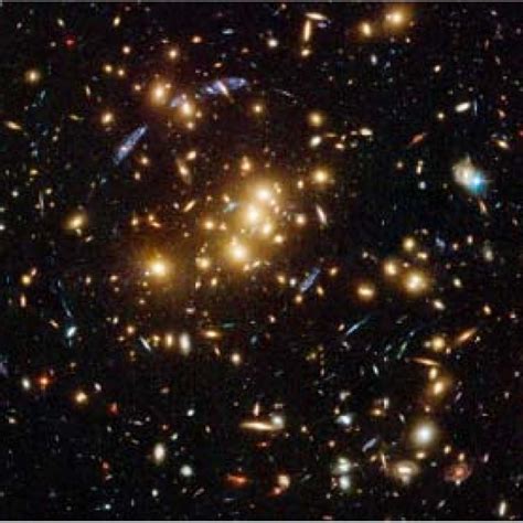 The " bullet cluster " 1E0657-56. The background image shows the ...