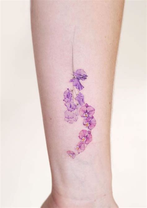 Purple Flower Tattoo - TattooLopediaTattooLopedia