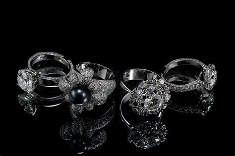 Collectionsof rings with diamond isolated on black background | Stock Photo | Colourbox