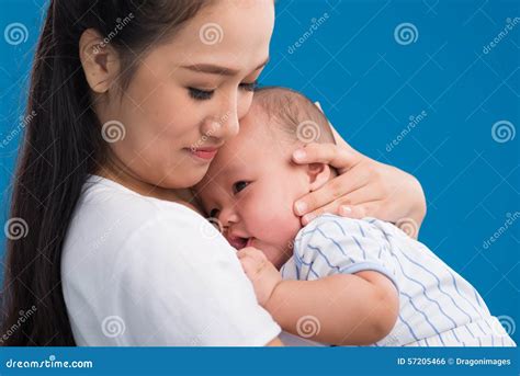 Hugging newborn baby stock photo. Image of childhood - 57205466