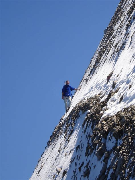 HD wallpaper: person climbing steep snow covered mountain, wanderer, trail | Wallpaper Flare