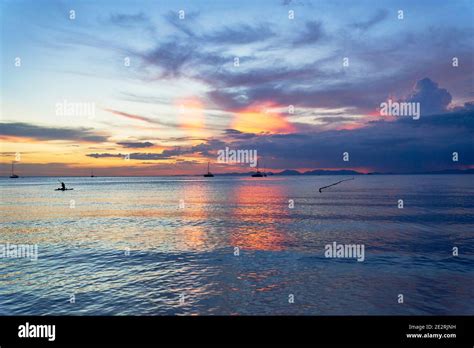 Amazing sunset over the Andaman sea off the West Coast of Thailand viewed from Railay Beach ...