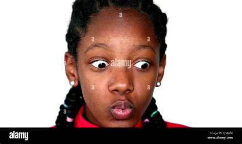 African girl surprise reaction, black teen young woman close-up face reacting with shock Stock ...