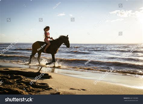 368 Woman Beach Horse Swimsuit Images, Stock Photos & Vectors ...