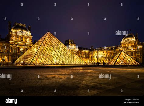 Louvre Museum at Night Stock Photo - Alamy