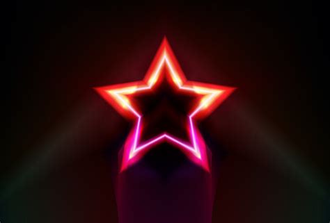 glowing star on a black background. Glowing red star with space background. abstract red star ...