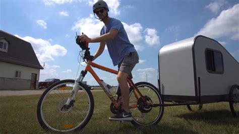 Watch This Guy Electrify His Bike To Tow A DIY Camper Trailer