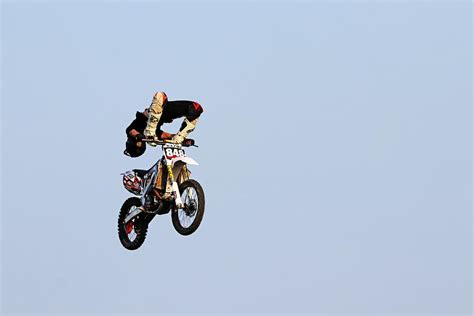 Dirt Bike Stunts - In The Air V Photograph by Debbie Oppermann - Pixels