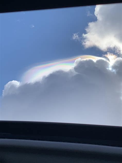 Spotted a rainbow above the clouds : r/pics