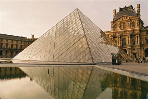 Louvre Museum with its glass pyramid. | Day tours, River cruises ...