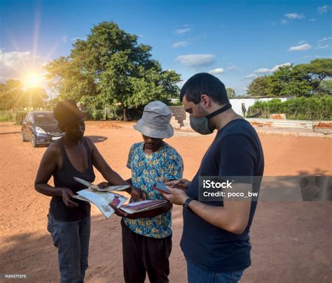 African Village Life Stock Photo - Download Image Now - Slum, Women, 30-34 Years - iStock