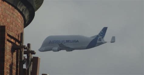 Giant Airbus Beluga plane aborts landing and is seen above Liverpool ...