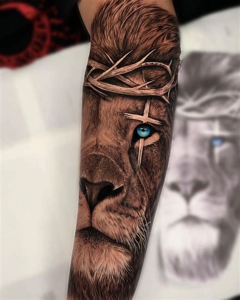 Lion Blue Eyes Tattoo by @gabrielsouza.tattoo - Tattoogrid.net