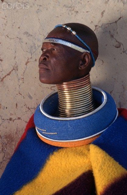 Ndebele Woman in Traditional Dress. Sophy Mgolozi Motha's Ndebele adornment includes idzilla ...