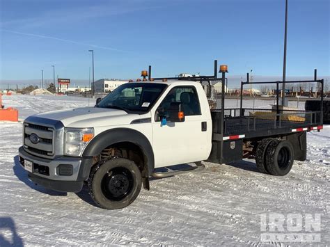 2013 Ford F550 XLT Super Duty 4x4 Flatbed Truck in Nisku, Alberta, Canada (IronPlanet Item #8341652)