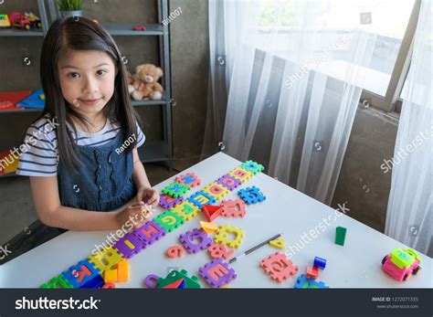 Kids Playing Alphabet Puzzle Pieces Together Stock Photo 1272071335 ...