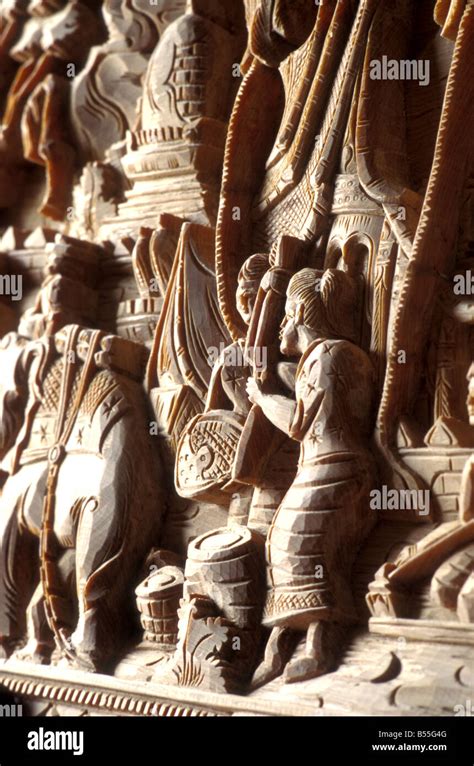 wood carving vientiane laos Stock Photo - Alamy