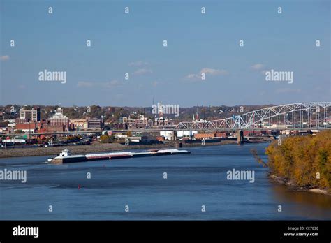 IA, Dubuque, view of Mississippi River and downtown Dubuque, with Towboat and barges, and Julien ...