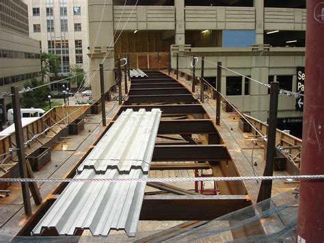 Walkways with Cambered Steel Beams | The Chicago Curve