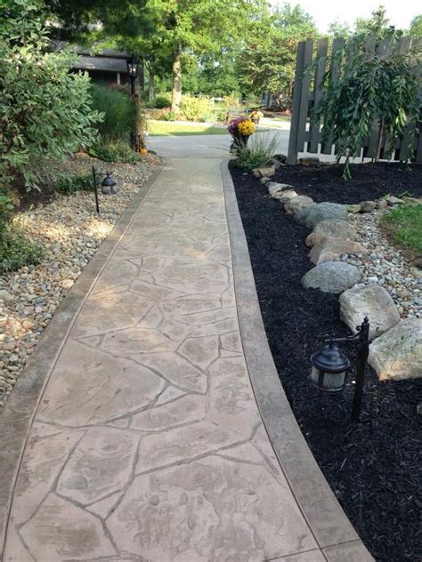 Walkway w rocks & mulch, stamped concrete. | Sidewalk landscaping, Stamped concrete walkway ...