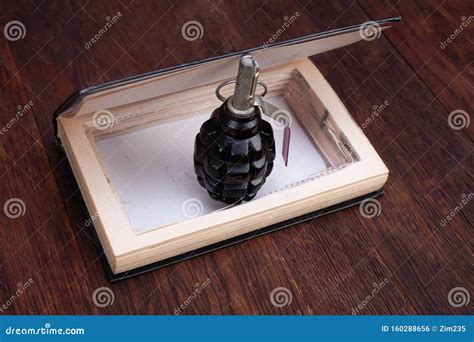 Hand Grenade Hidden in a Book Stock Photo - Image of godfather, blood: 160288656