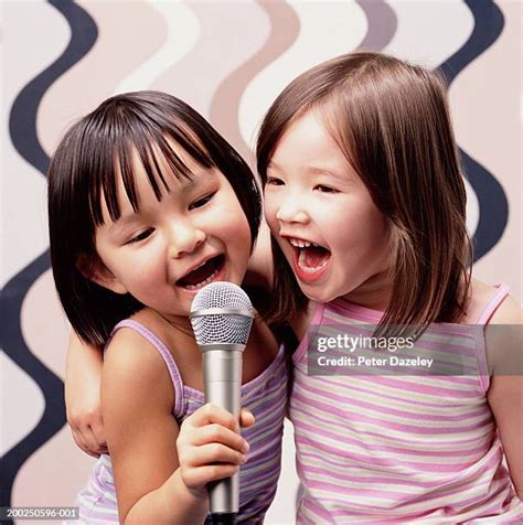 Chinese Girl Singing Photos and Premium High Res Pictures - Getty Images