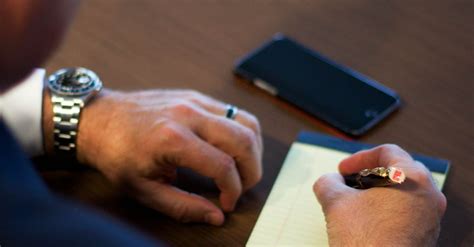 Person Writing Notes on White Ruled Paper · Free Stock Photo