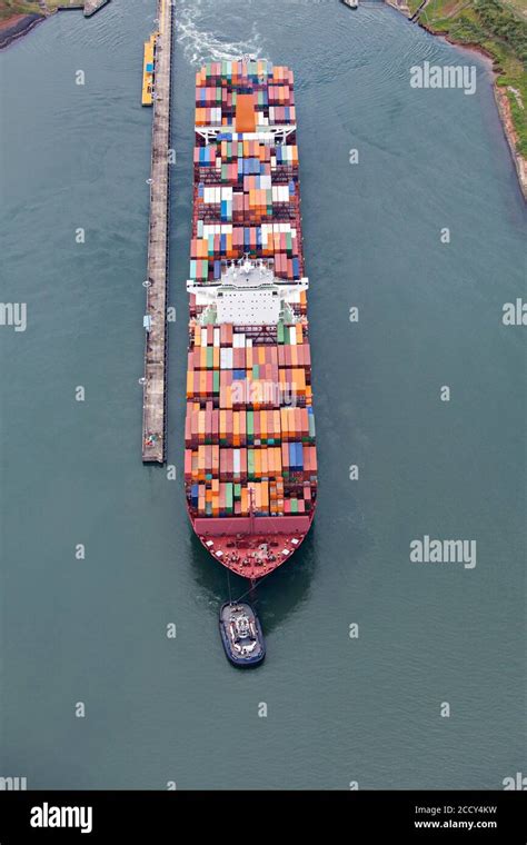 A Neo-Panamax container ship heading to the Atlantic side in Panama Canal, aerial view, Panama ...