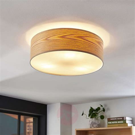 Dominic wooden ceiling light with a round shape | Lights.co.uk