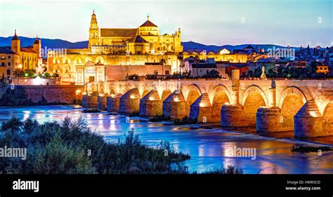 Roman Bridge and Guadalquivir river Stock Photo - Alamy