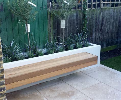 Grey limestone patio paving raised beds floating hardwood bench Clapham London - London Garden ...