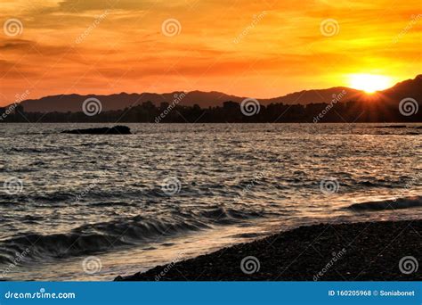 Sunset on Isla Plana Beach in Cartagena, Murcia Stock Photo - Image of beach, orange: 160205968