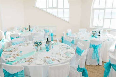 Turquoise Wedding at the Seaside with 31 Guests · Rock n Roll Bride