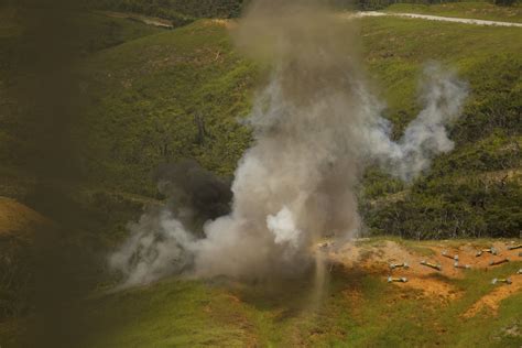 Explosive Ordnance Disposal technicians, reconnaissance Marines practice standoff munitions ...