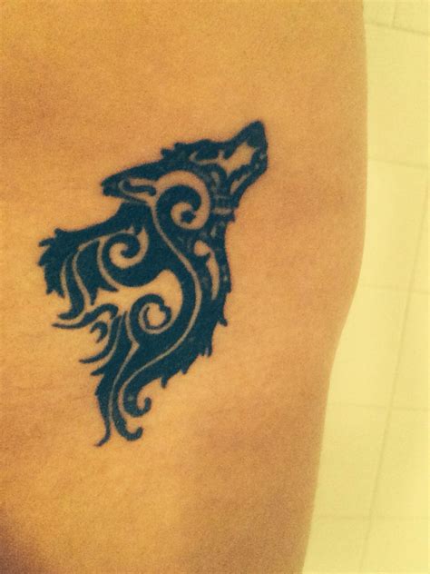 Alpha Wolf Symbol Tattoo