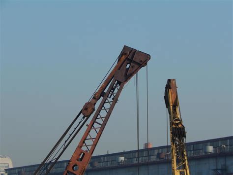 Port cranes for cargo transportation in the port logistics complex 3648227 Stock Photo at Vecteezy