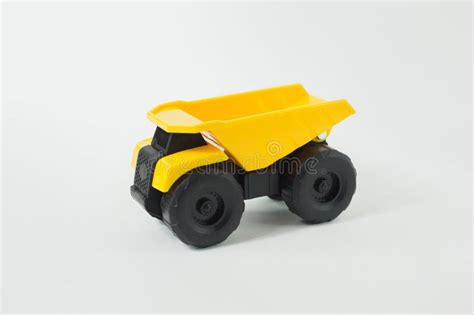 Yellow Dump Truck Toy Isolated on White Background. Stock Image - Image of environment, outdoors ...