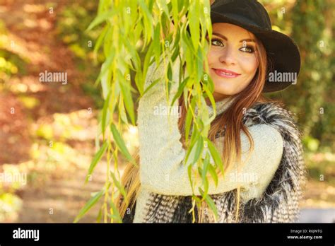 Lovely cute gorgeous woman wearing black hat fur waistcoat sweater ...