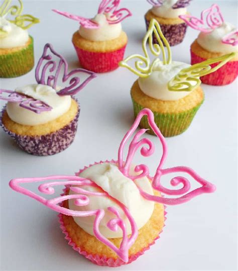 Chocolate Butterfly Decorations Tutorial | The WHOot | Fairy cupcakes, Chocolate butterflies ...