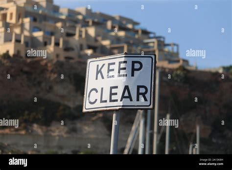 Keep clear road sign on blur background, horizontal Stock Photo - Alamy