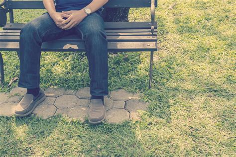 Sad man sitting alone in the park 3114010 Stock Photo at Vecteezy