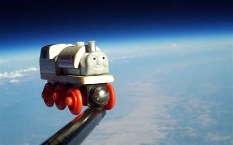 A Father and His Son Send a Toy Train to Space