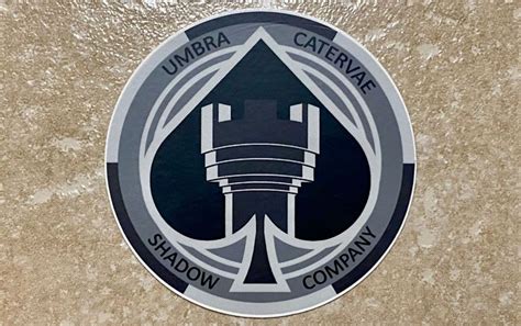 an emblem on the side of a building that says umbra cathervar shadow company