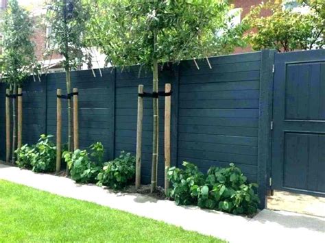 Image result for green painted fences images | Backyard fences, Fence design, Privacy fence designs