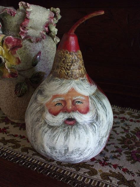 an image of a vase with a gnome face on it