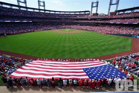 Photo: Large American Flag Held By Volunteers In Center Field - SLP2022091801 - UPI.com