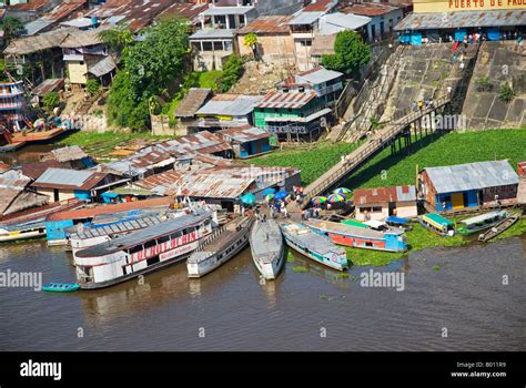 Peru, Amazon, Amazon River, Iquitos. Aerial view of the port, harbour and settlements of Iquitos ...